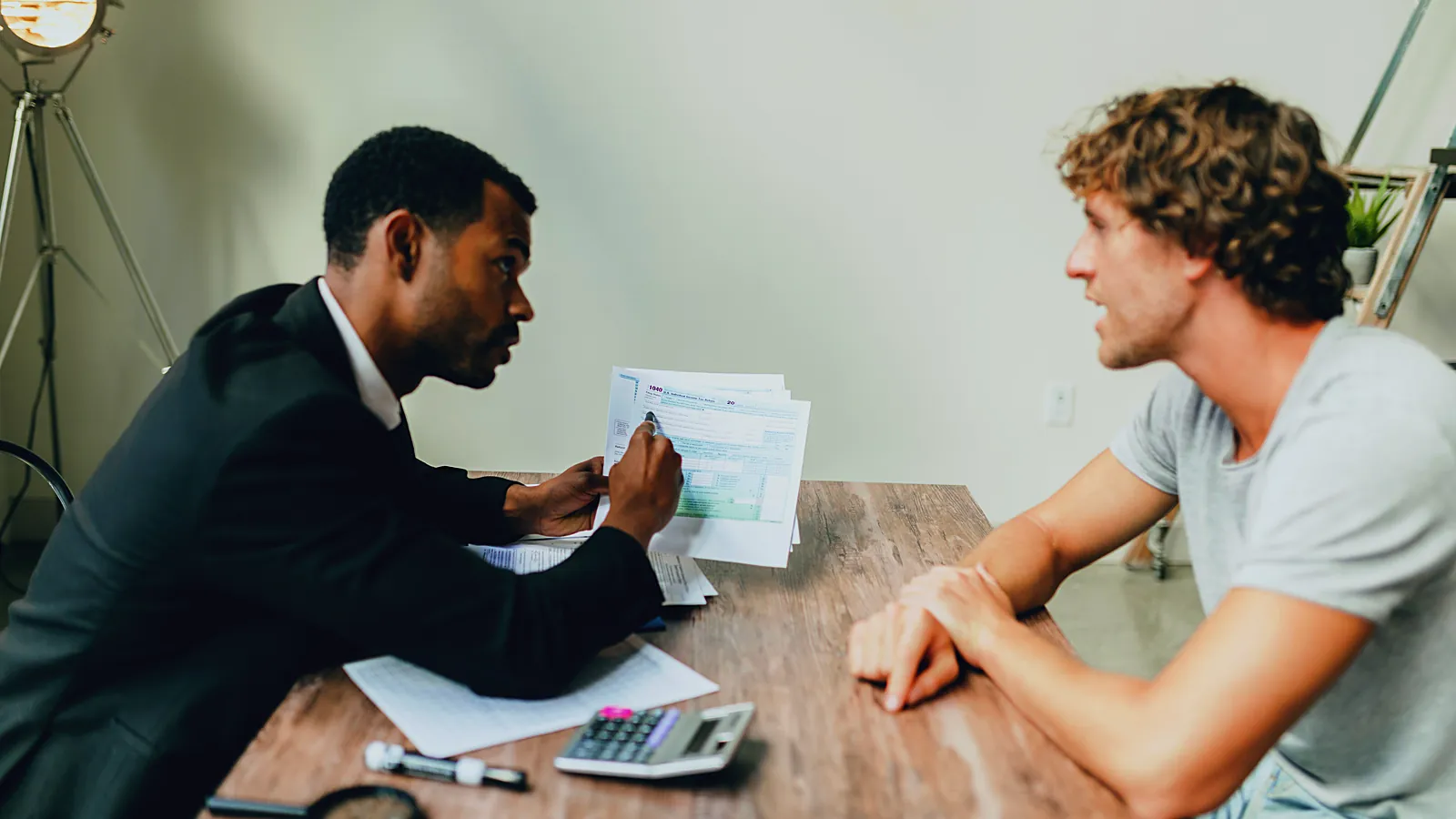 Financial advisor going over paperwork with a small business owner