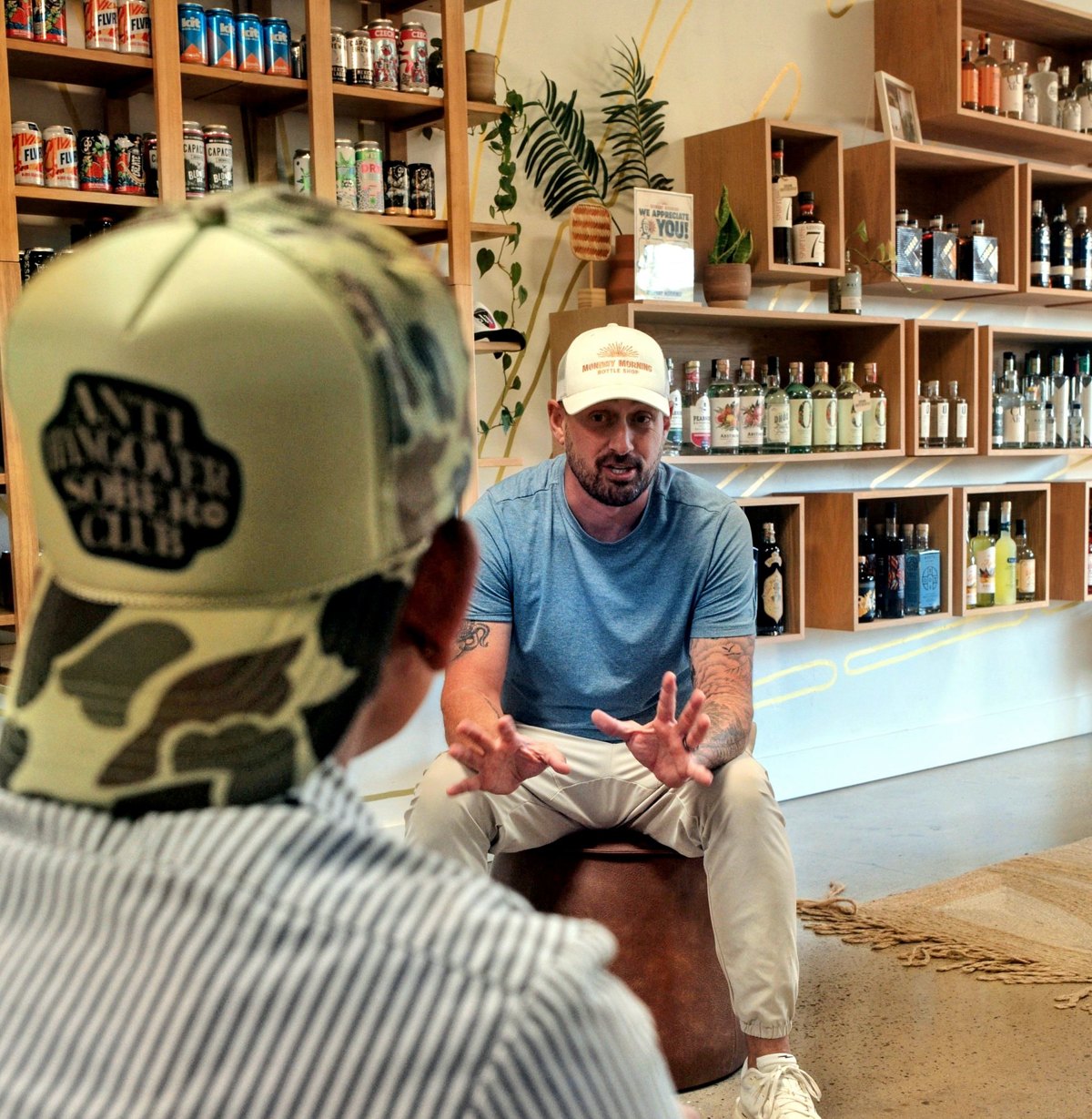 Zane Curtis talking through the numbers with a shop owner